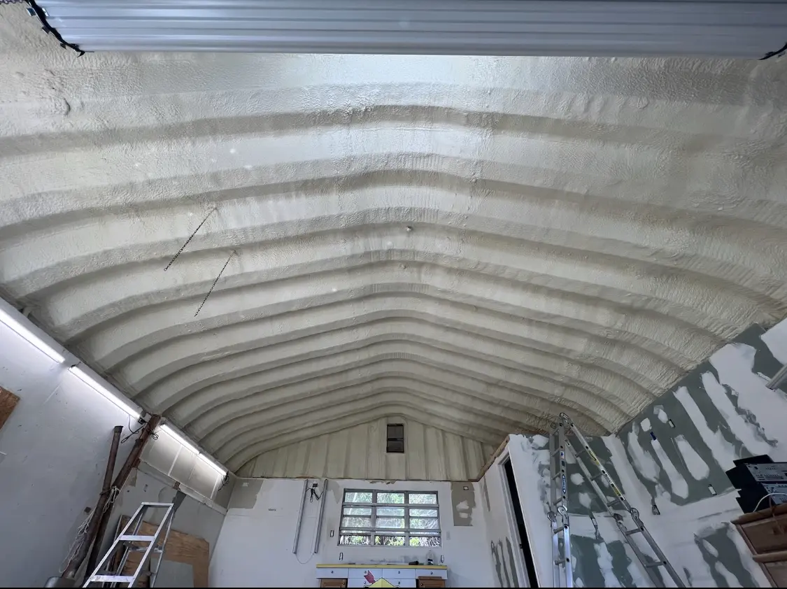 Spray polyurethane foam applied to the underside of a metal roof deck in Lakewood