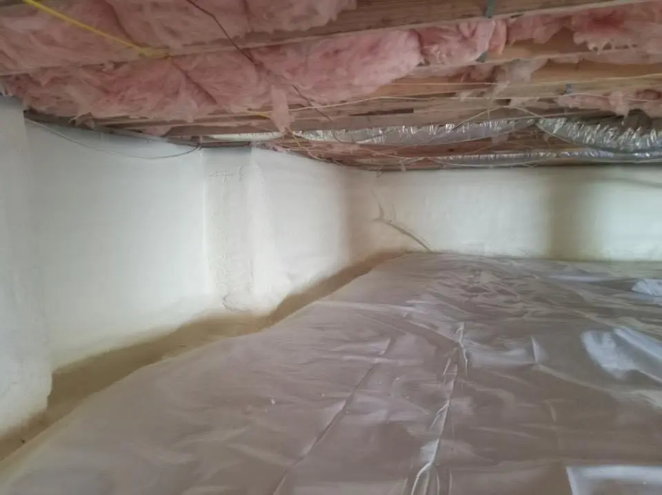 Crawl space encapsulation with closed-cell spray foam for Commercial Roof Restoration in Lakewood